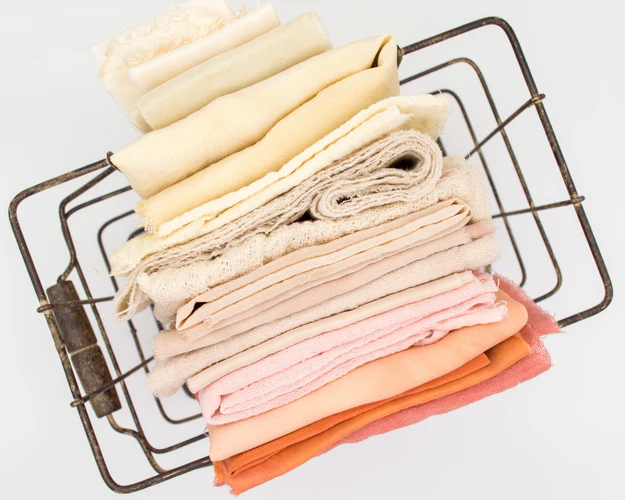 a basket with different fabrics 